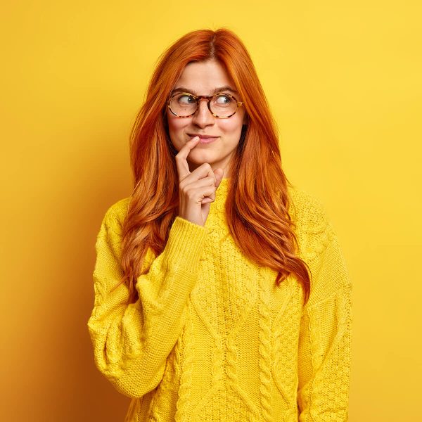 portrait-of-pleased-nice-looking-young-woman-533JJ9R